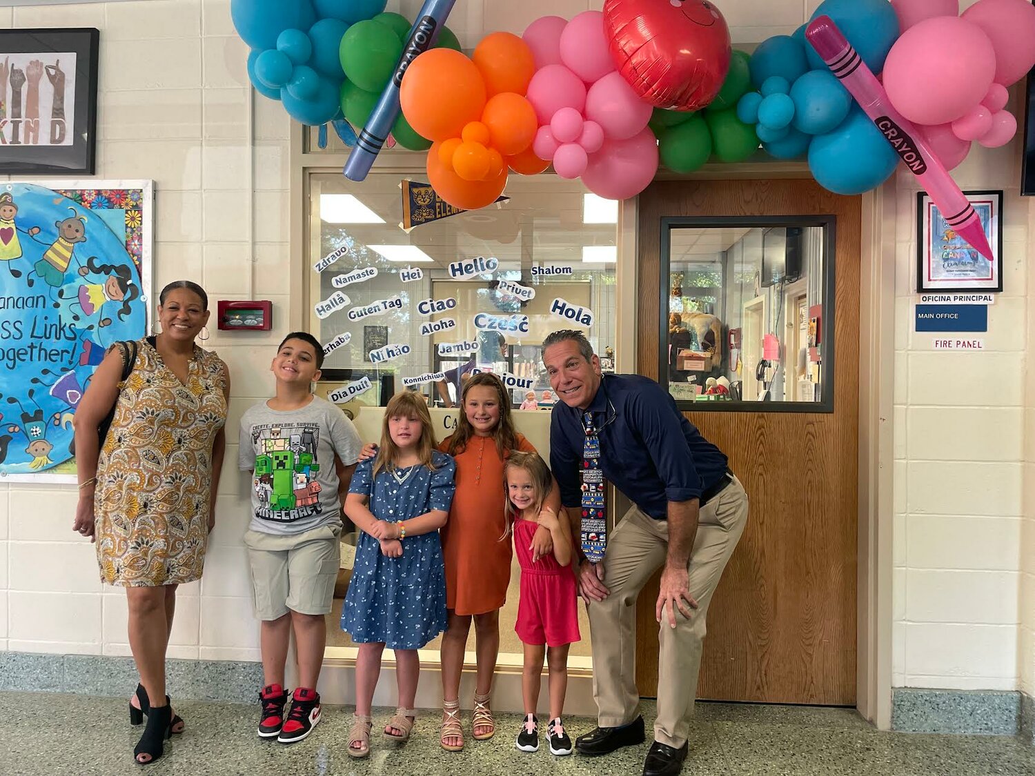 Superintendent of schools Dr. Donna Jones met with Canaan Elementary School principal Robert Epstein to welcome students back to school. Pictured with them from left to right: Giovanni Clark, third grade; Rebecca Zabinski, third grade; Lila Felice, third grade; and Luna Felice, kindergarten.